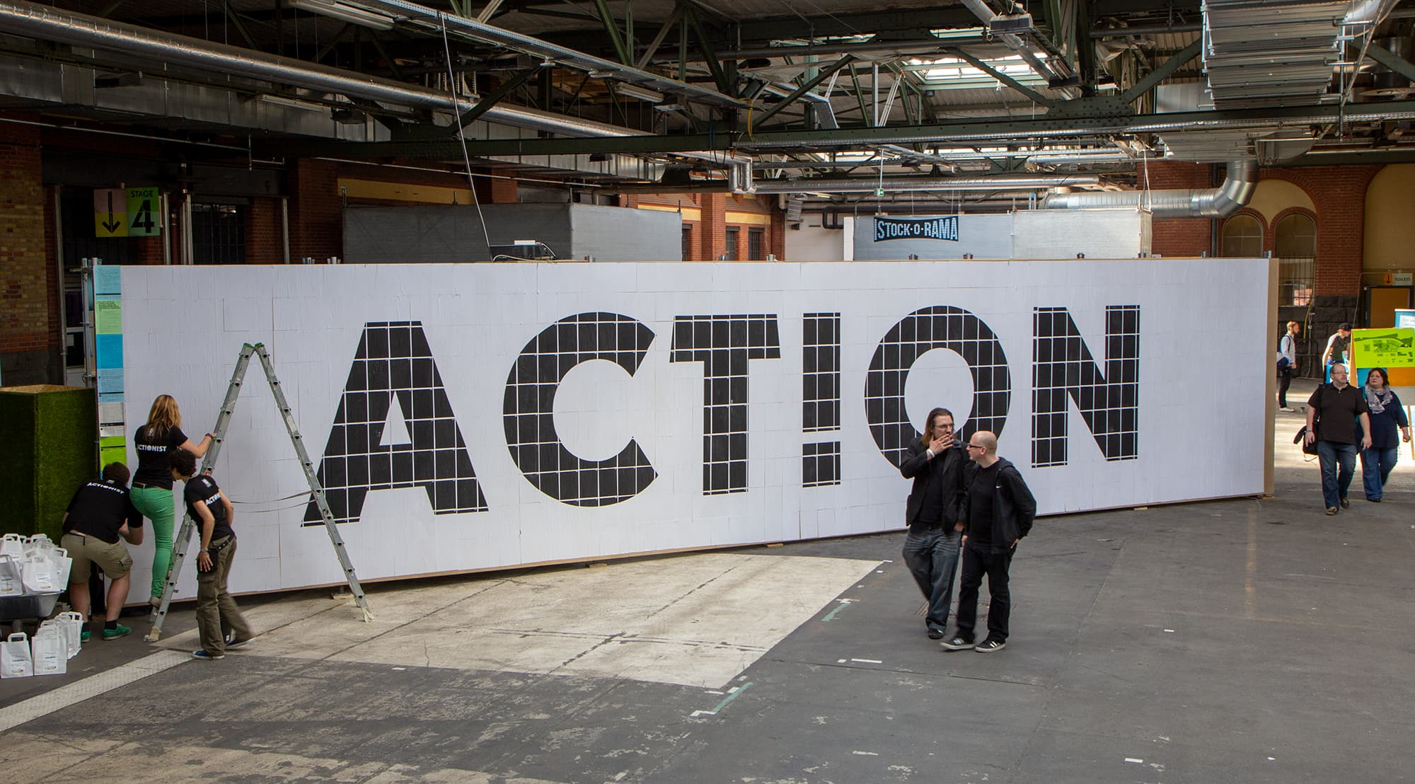 The first tweets are glued to the wall.